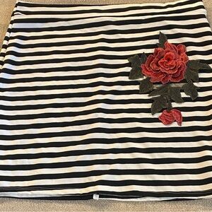 Striped Black and White Skirt with Red Floral Design